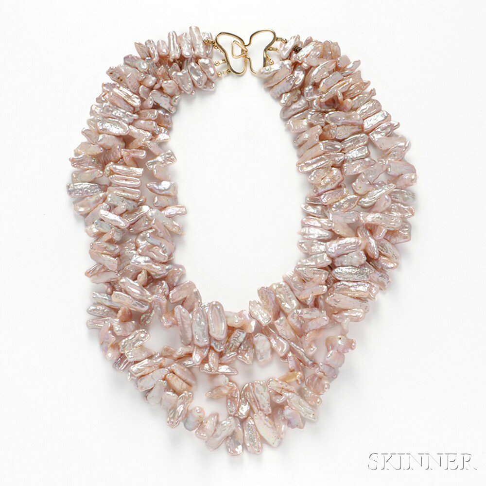 Appraisal: Freshwater Pearl Necklace composed of three strands of pink pearls