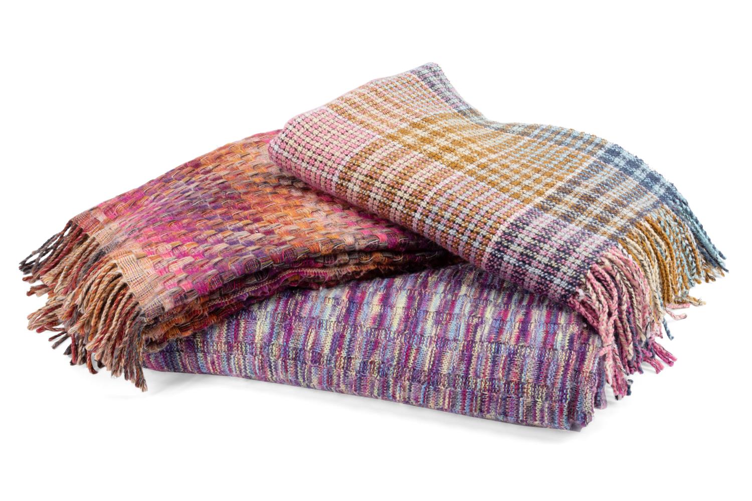 Appraisal: THREE MISSONI COLORFUL KNITTED WOOL THROWS Missoni Italian group of