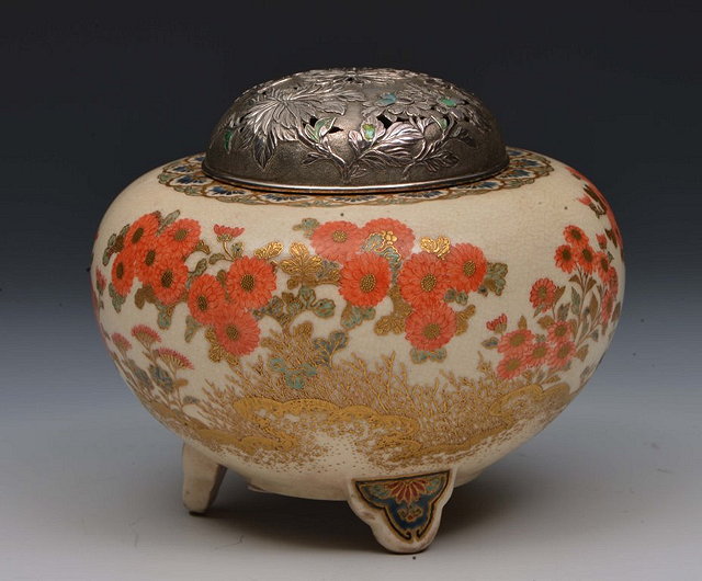 Appraisal: A JAPANESE KYOTO SATSUMA TRIPOD BOWL painted Kiku and lotus