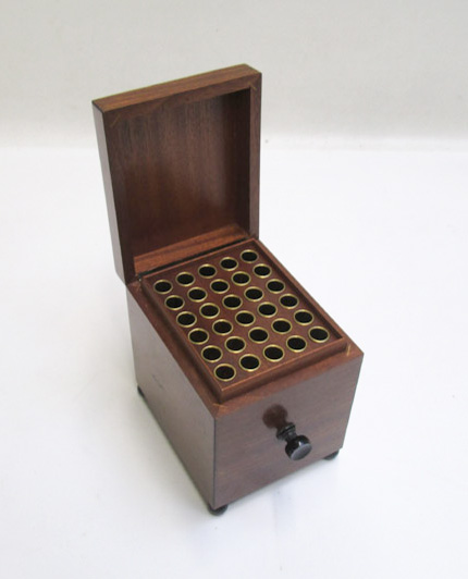 Appraisal: AUSTRIAN MAHOGANY CIGARETTE HUMIDOR MUSIC BOX The lid featuring marquetry