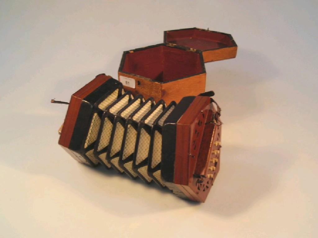 Appraisal: A Lachenal Co patent concertina with mahogany ends in a