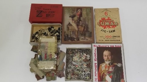 Appraisal: A quantity of jigsaw puzzles circa