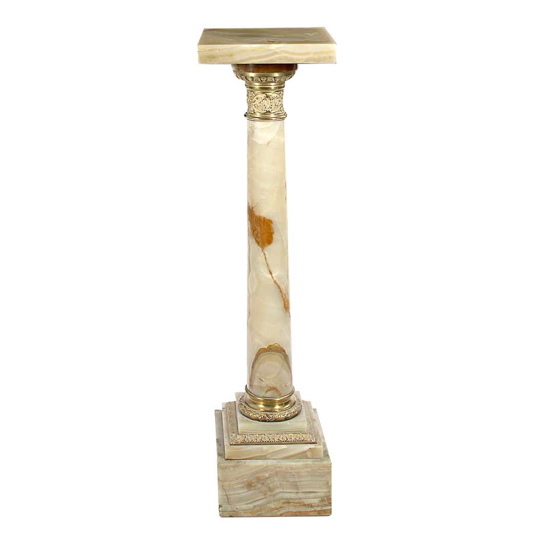 Appraisal: Neoclassical Style Gilt-Metal Mounted Onyx Pedestal The square top above