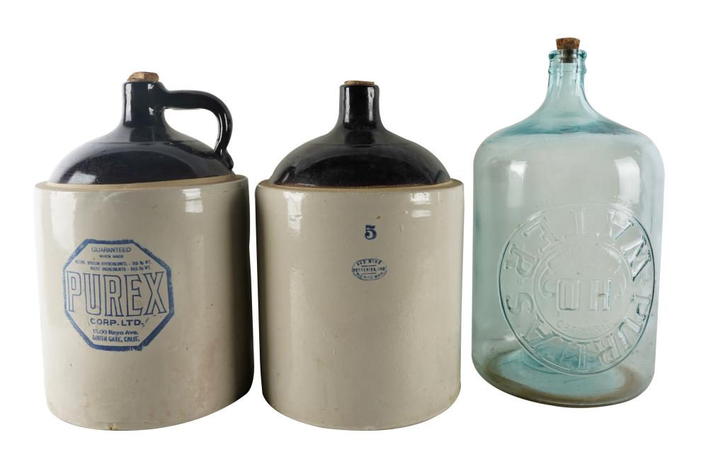 Appraisal: THREE LARGE AMERICAN BOTTLEScomprising two Red Wing Potteries stoneware jugs