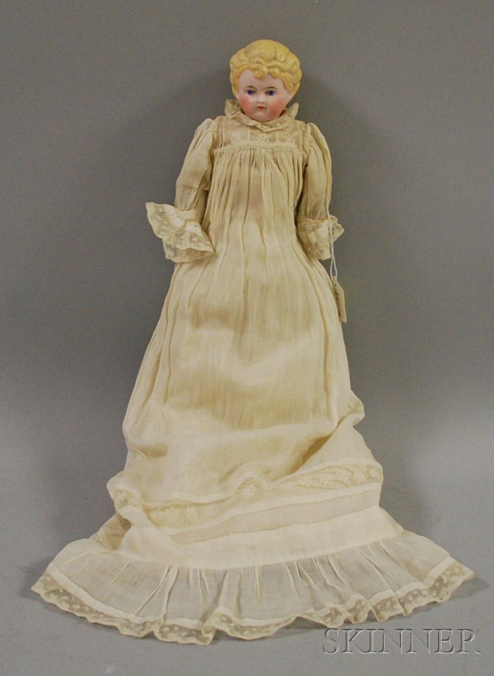 Appraisal: Small Blond Bisque Head Doll with bisque hands and cloth