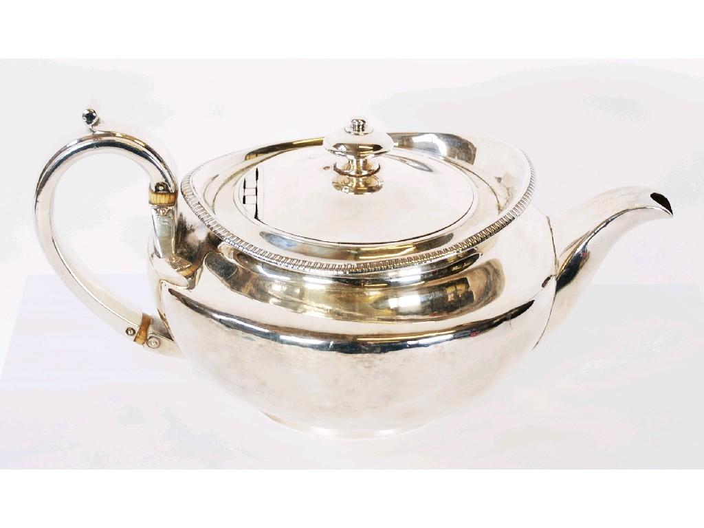 Appraisal: GEORGE III SILVER TEAPOT squat shaped circular with flush hinged