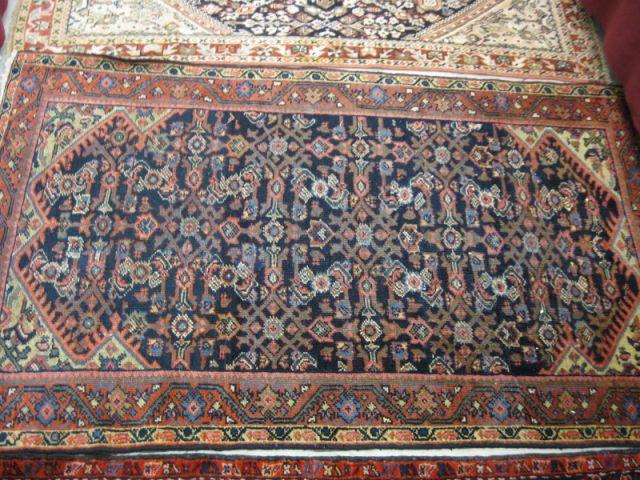 Appraisal: Mahal Persian Handmade Rug overall stylized floral on indigo field