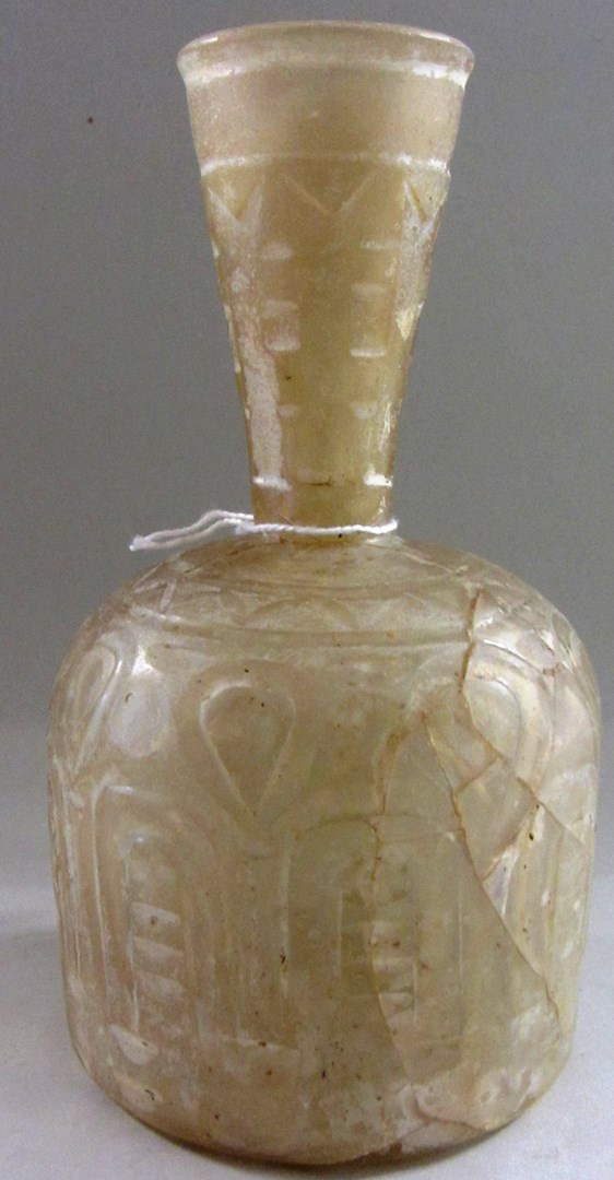 Appraisal: A wheel-cut clear glass bottle Iran th- th century mould