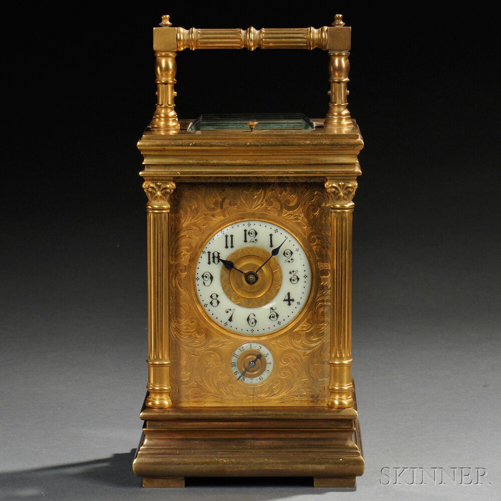 Appraisal: French Carriage Clock the brass and beveled glass case with