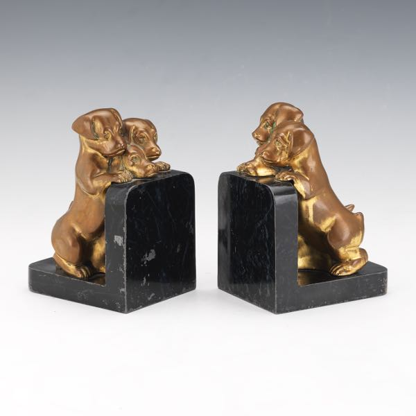 Appraisal: PAIR OF ART DECO GILT BRONZE AND MIXED METALS PUPPY