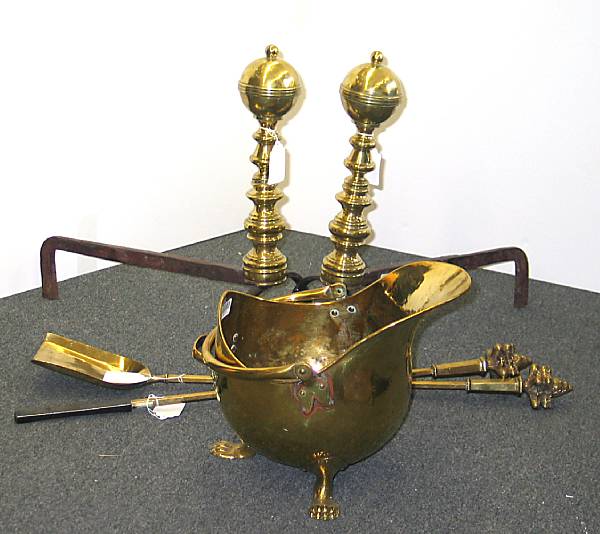 Appraisal: An assembled group of brass fireplace accessories th th century