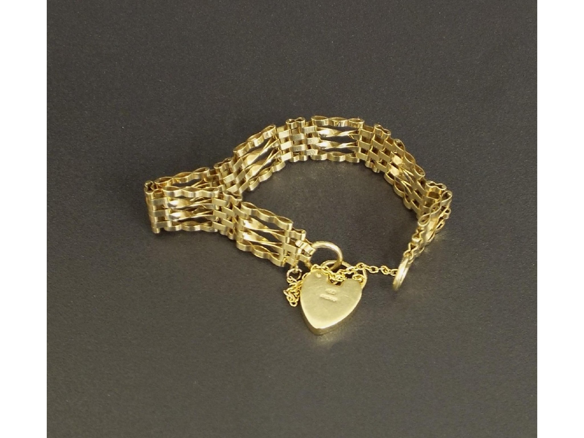 Appraisal: ct four bar gate bracelet with a padlock clasp gm