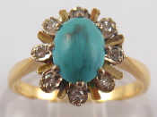 Appraisal: A yellow metal tests carat gold turquoise and diamond ring