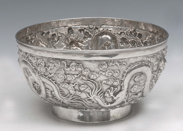 Appraisal: A CHINESE SILVER BOWL of circular form on pedestal foot