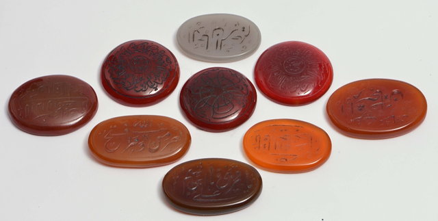 Appraisal: A GROUP OF EIGHT PERSIAN AGATE PLAQUES and one jade