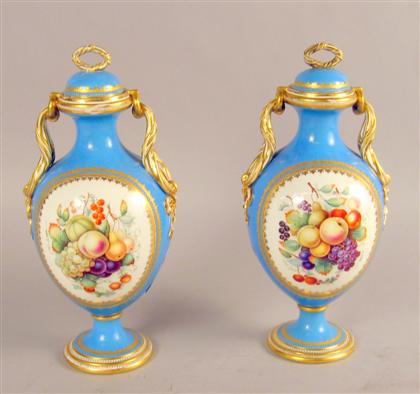 Appraisal: Pair of Coalport porcelain covered urns th century Each of