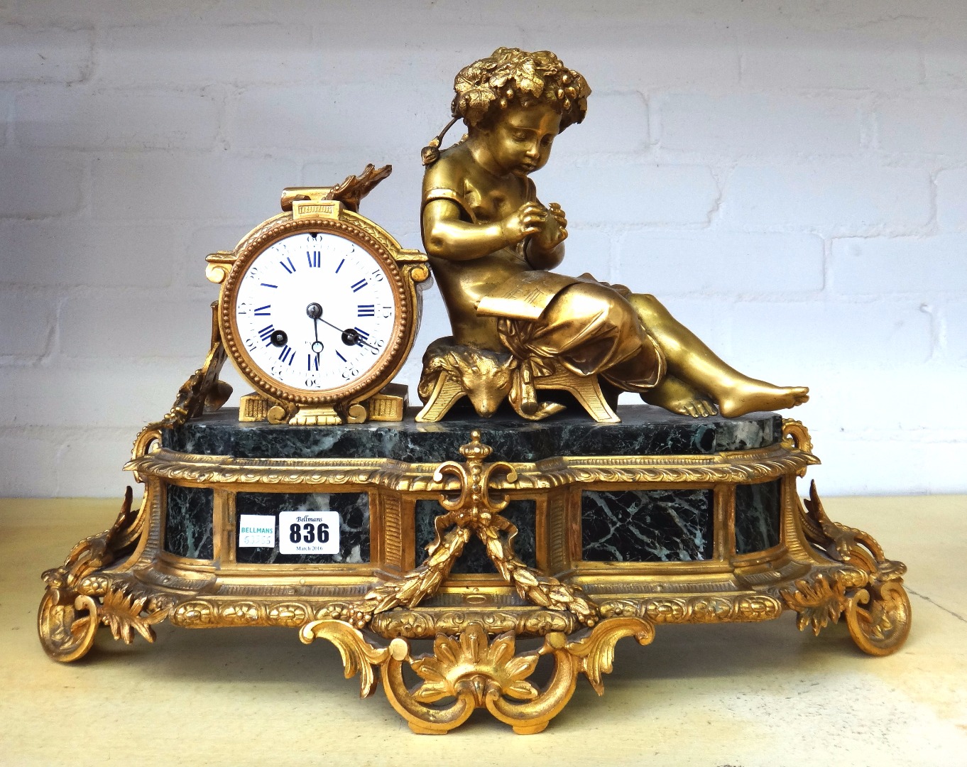 Appraisal: A French gilt bronze and marble mantel clock circa with