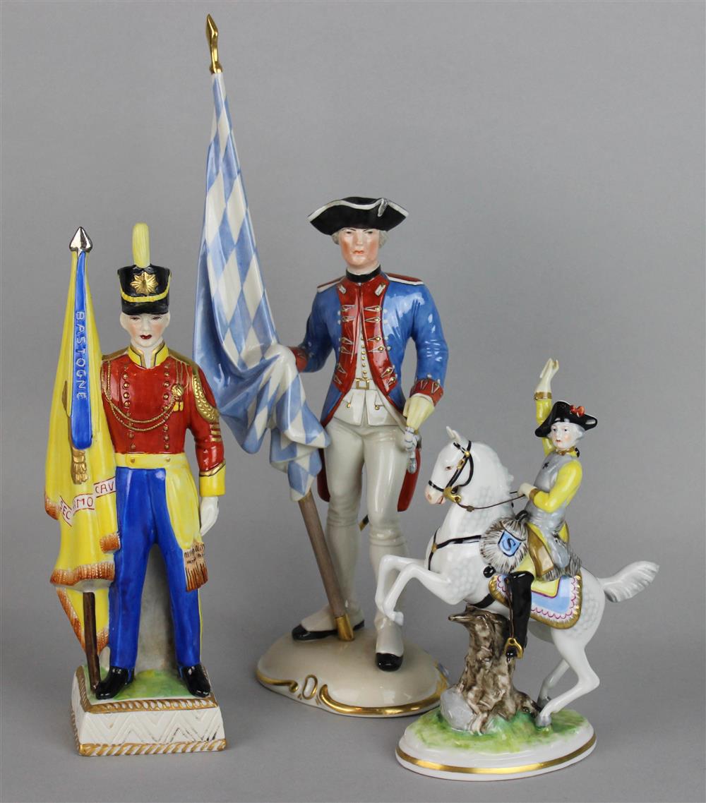 Appraisal: THREE CONTINENTAL PORCELAIN MILITARY FIGURES including a Nymphenburg eagle standing