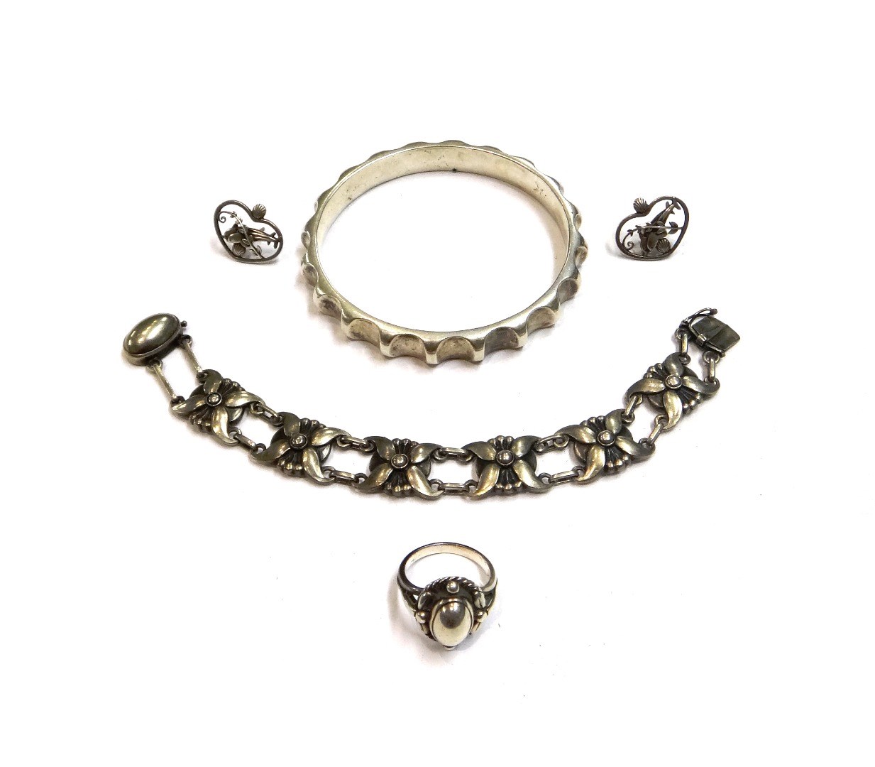 Appraisal: A group of Georg Jensen silver jewellery comprising a circular