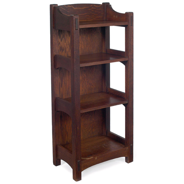 Appraisal: Lifetime magazine stand four shelves with arched toe-board and side