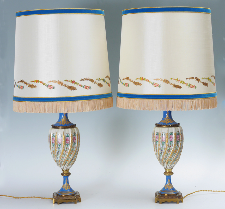 Appraisal: PAIR SEVRES STYLE FRENCH LAMPS Base bodies with center twist