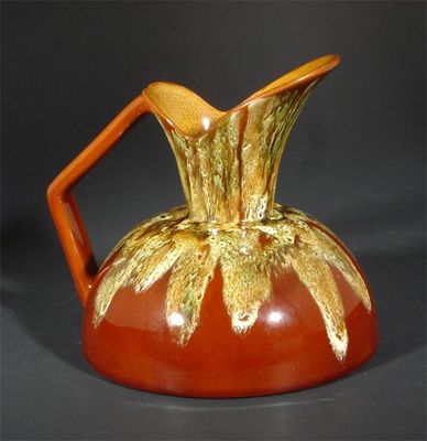 Appraisal: A Linthorpe Pottery ewer model no designed by Dr Christopher