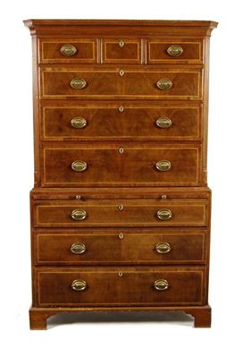 Appraisal: A George II walnut chest on chest inlaid stringing the