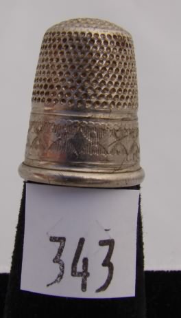 Appraisal: German thimble with diamond design on wide band