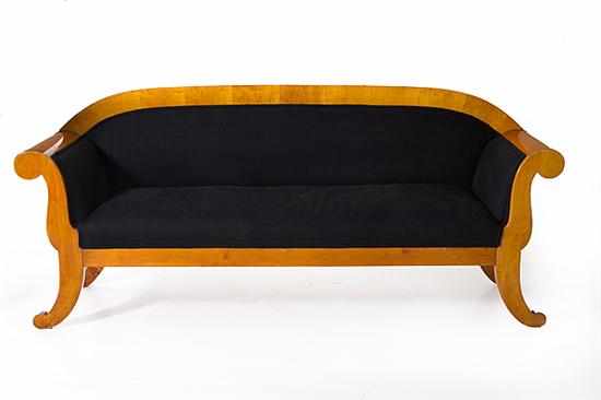 Appraisal: Biedermeier fruitwood sofa mid th century wide arching crestrail above