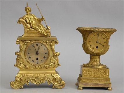 Appraisal: CHARLES X GILT-BRONZE CLOCK AND A LOUIS-PHILIPPE BRONZE CLOCK The