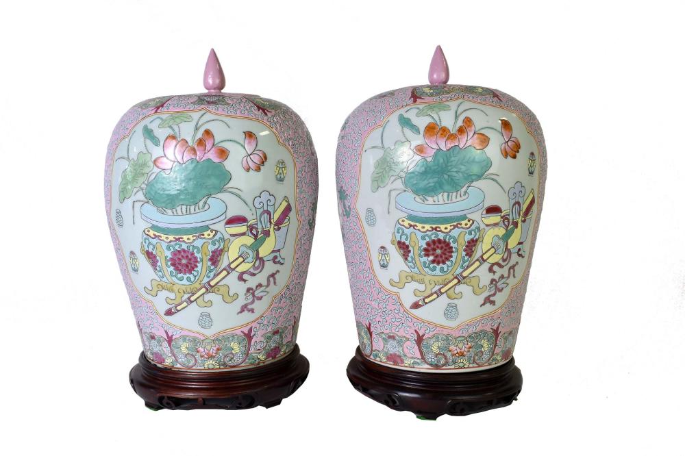 Appraisal: PAIR OF CHINESE FAMILLE ROSE PORCELAIN COVERED JARSEach ovoid vessel