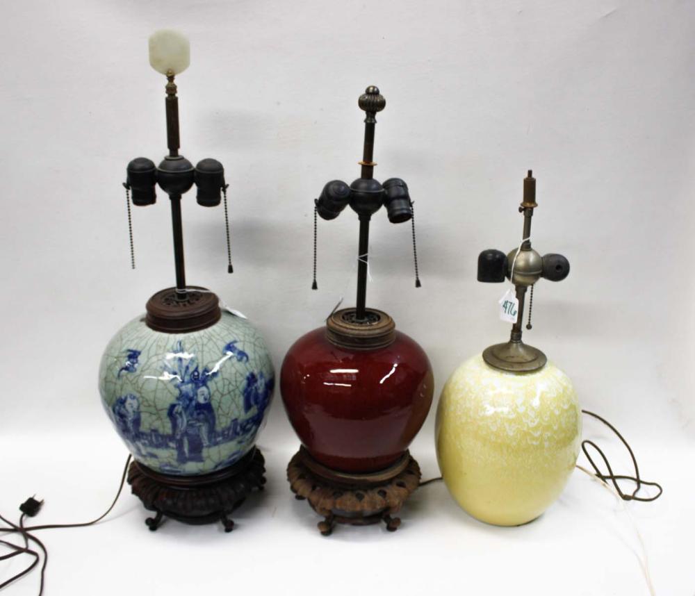 Appraisal: THREE PORCELAIN TABLE LAMPS Chinese porcelain table lamp featuring hand