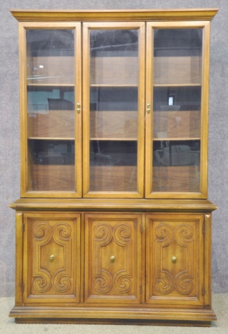 Appraisal: Meditteranean Style China CabinetWith glass doors above three carved drawers