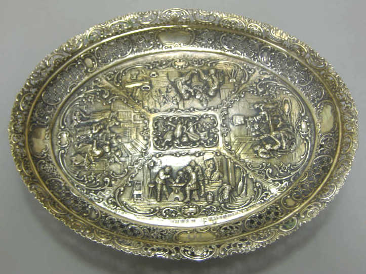 Appraisal: CONTINENTAL REPOUSSE SILVER OVAL TRAY Rococo style relief medallions of