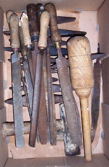 Appraisal: A quantity of chisels hammers and the mount for the