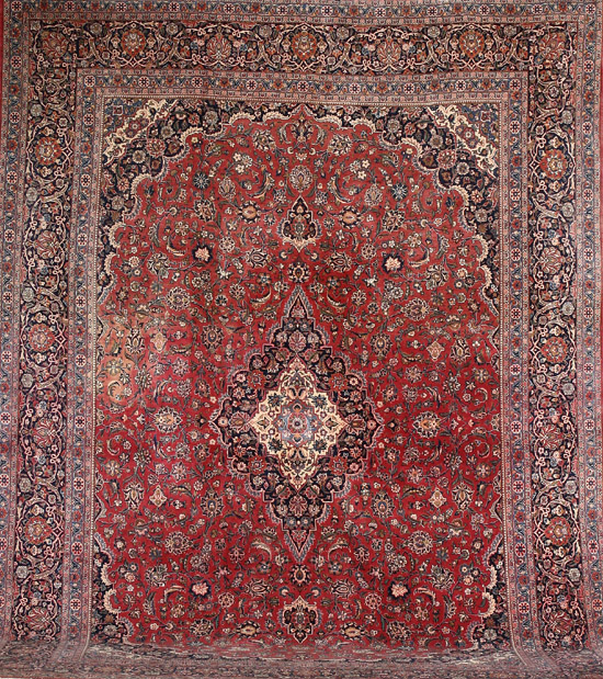 Appraisal: Keshan Rug Post Red ground with palmette and trellising vine