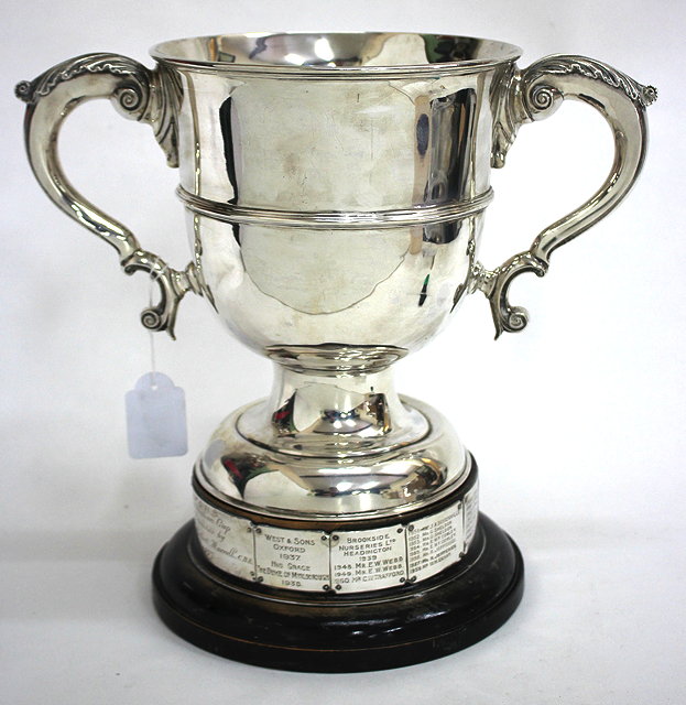 Appraisal: A VICTORIAN SILVER TROPHY CUP with twin scrolling handles marks