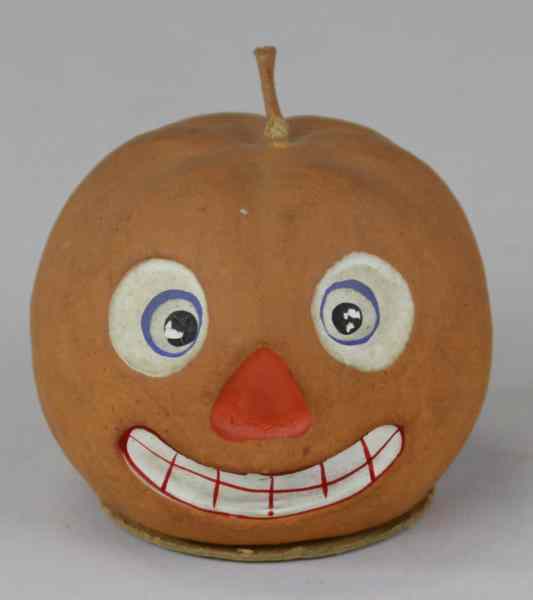 Appraisal: JACK-O-LANTERN CANDY CONTAINER Germany composition container done in colorful facial