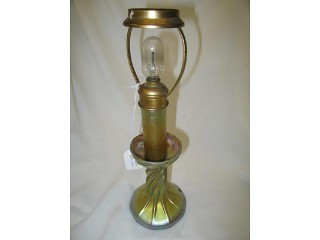 Appraisal: Tiffany Favrile Art Glass Candlestick Lamp golden iridescent swirling base