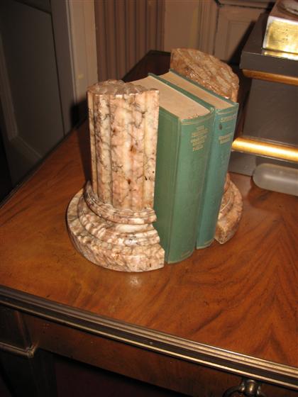 Appraisal: Pair of pink marble column base bookendsearly th century