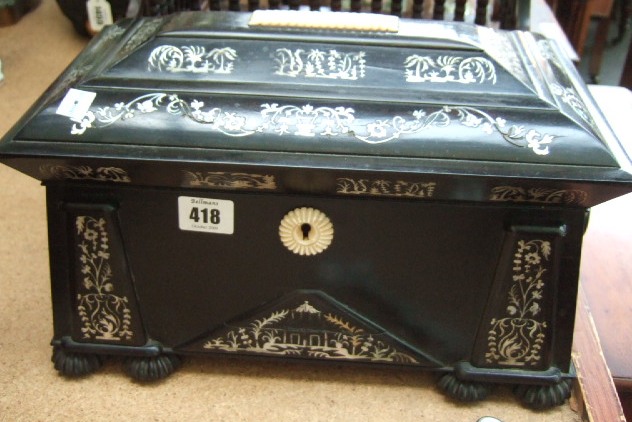 Appraisal: A th century ebonised and mother of pearl inlaid sarcophagus