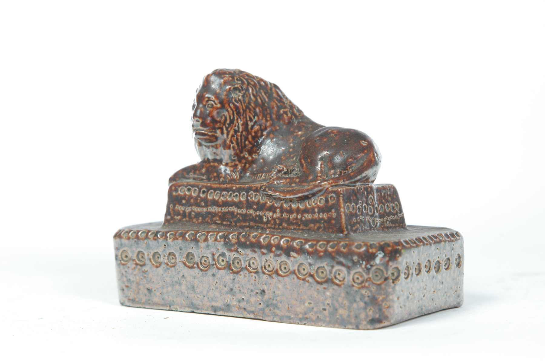 Appraisal: OHIO SEWERTILE LION Early th century Reclining lion on a