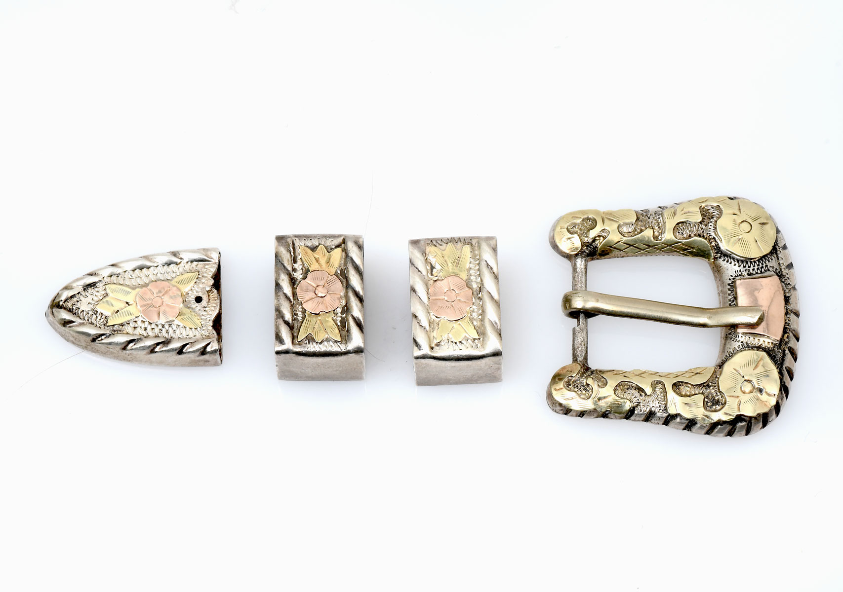 Appraisal: K RANGER BUCKLE SET Early sterling and K four piece