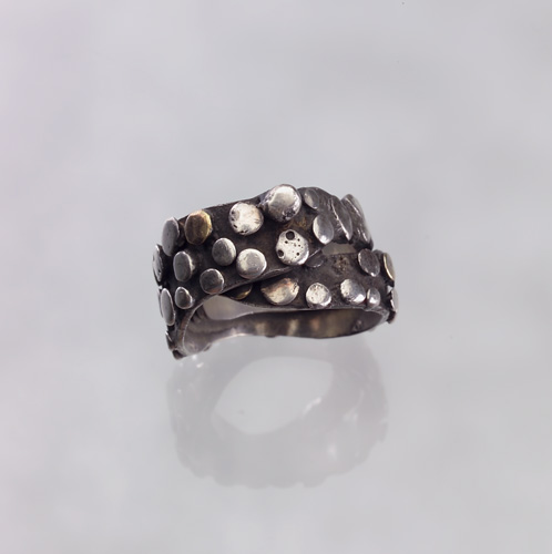 Appraisal: ART SMITH Gentleman's ring in silver and K gold with