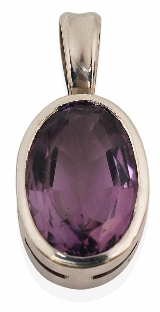 Appraisal: AN AMETHYST PENDANT The oval amethyst collet set in ct