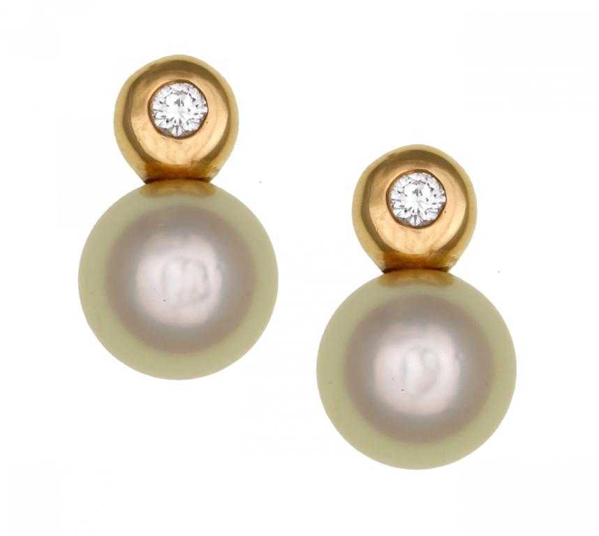 Appraisal: A PAIR OF CULTURED PEARL AND DIAMOND EARRINGS each with