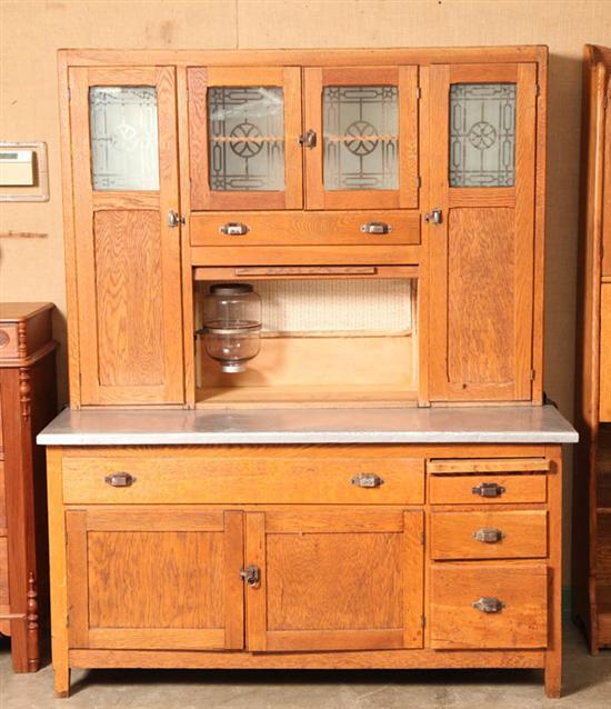 Appraisal: HOOSIER CUPBOARD Oak with two frosted glass central doors flanked