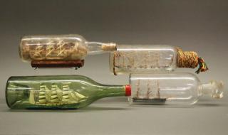 Appraisal: Ships in Bottles Four early th century Ships in glass