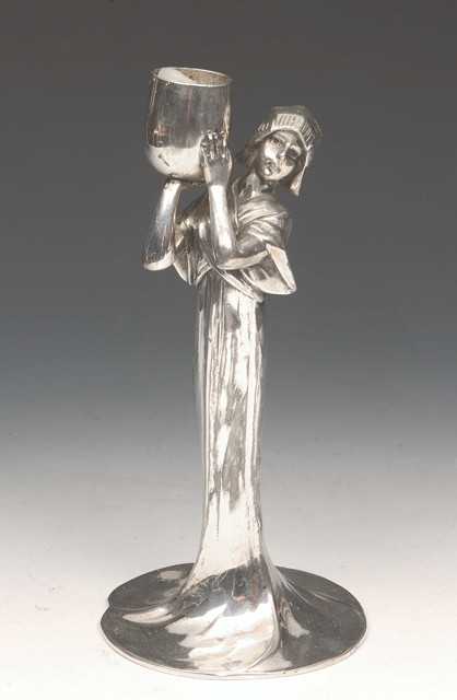 Appraisal: An Art Nouveau continental pewter candlestick in the form of