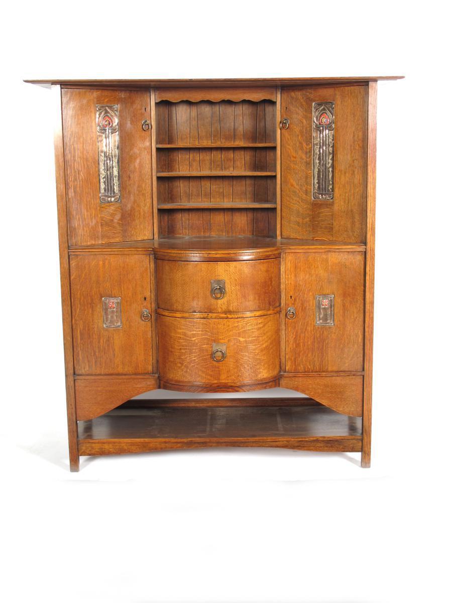 Appraisal: A Wylie amp Lochhead oak sideboard